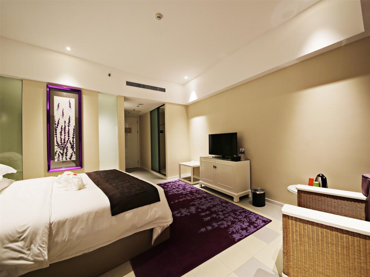 Howard Johnson Flower City Hotel Куньмин Экстерьер фото
